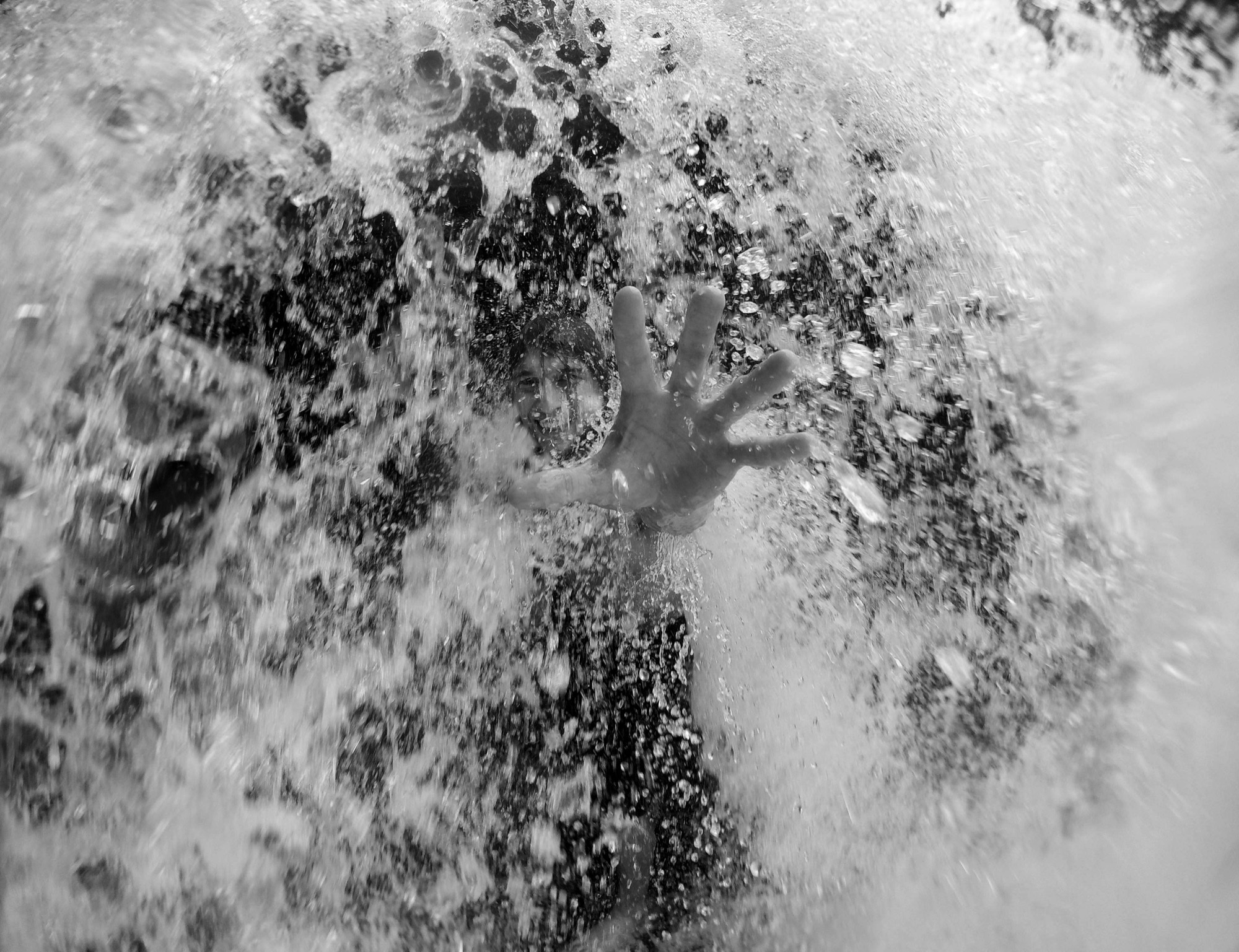 Water breaking over stone